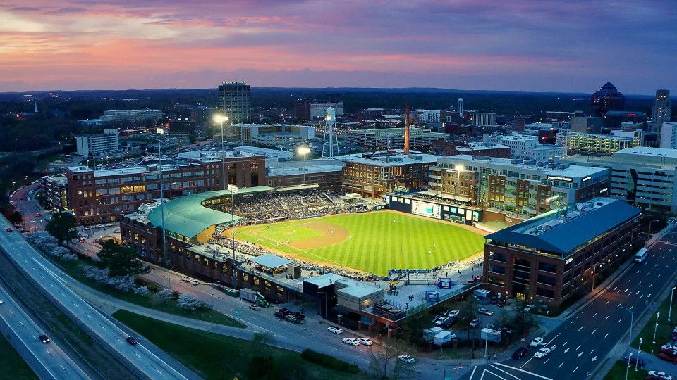 Aerial view of Durham Bulls Athletic Park at dusk