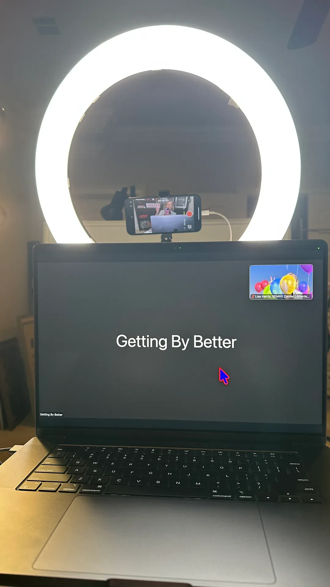 Lisa Harris smartphone video setup with ring light and laptop on a home office desk