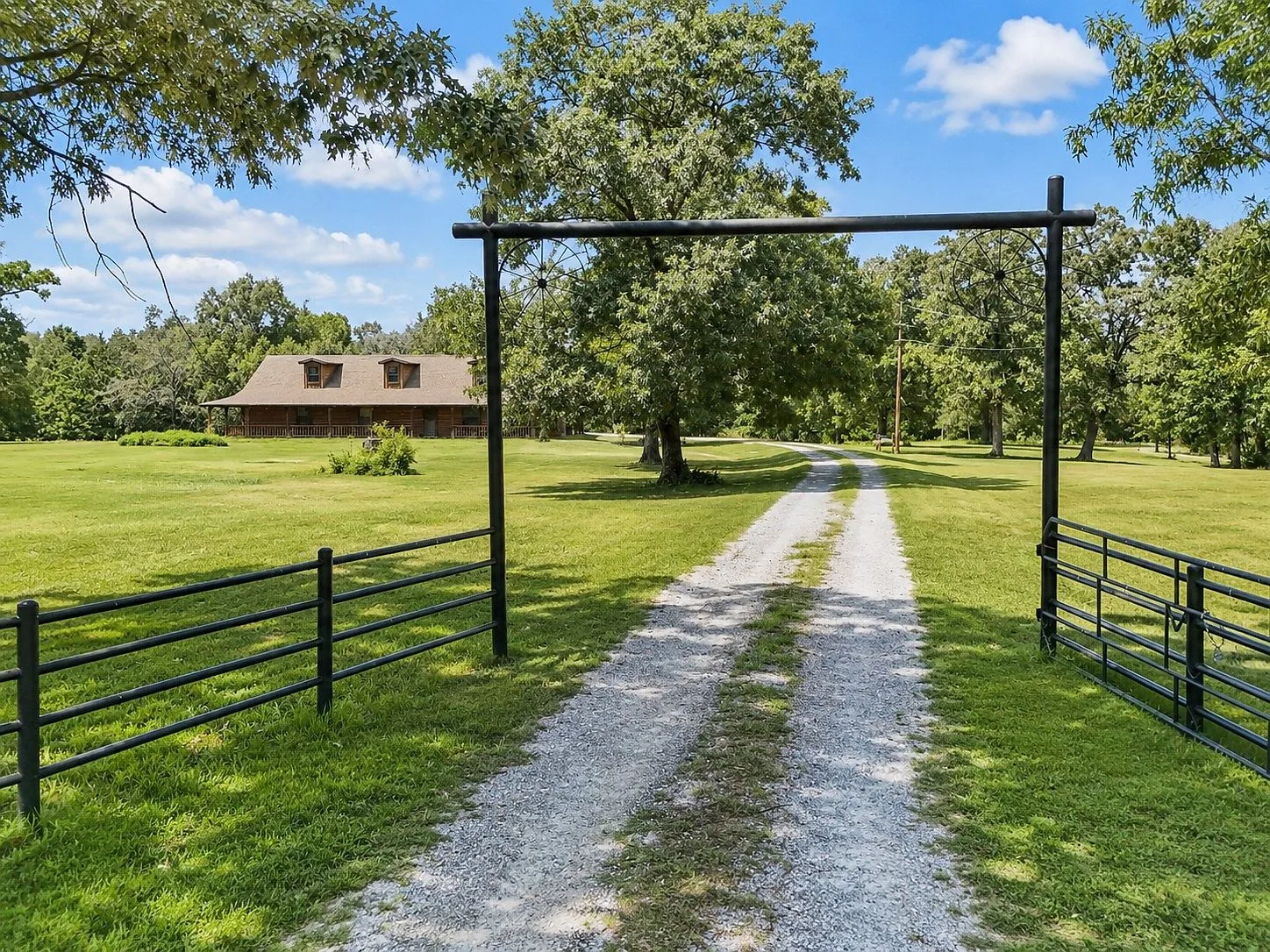 Property entry gate looking toward the home