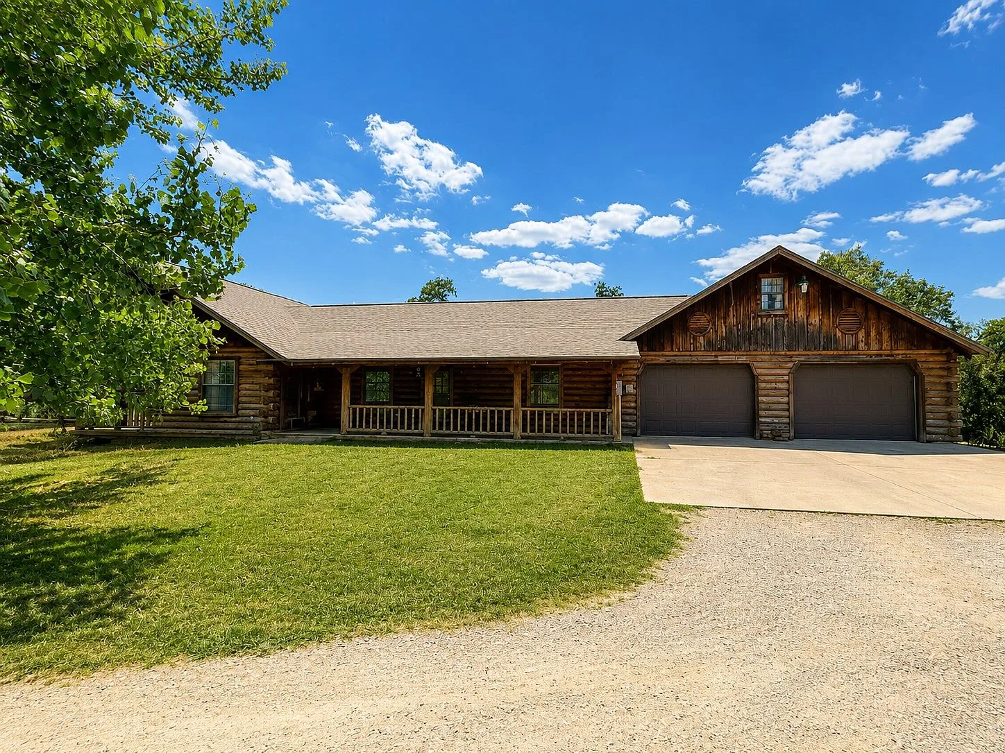 Wide angle exterior of the log cabin