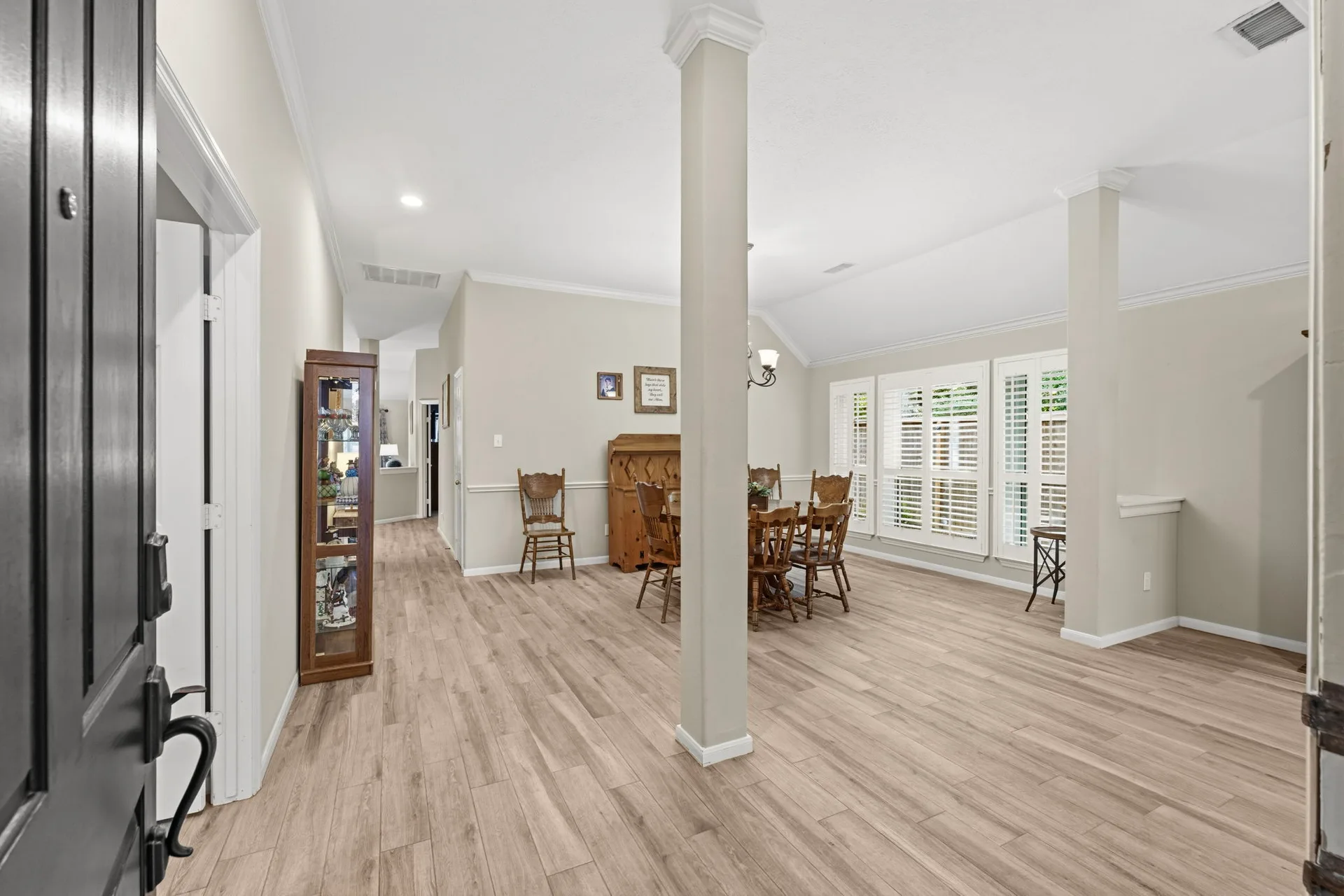 View from the front entry looking into the dining area and hallway