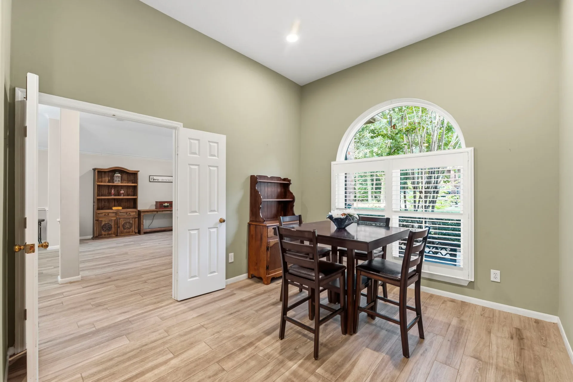 Formal dining area with plantation shutters