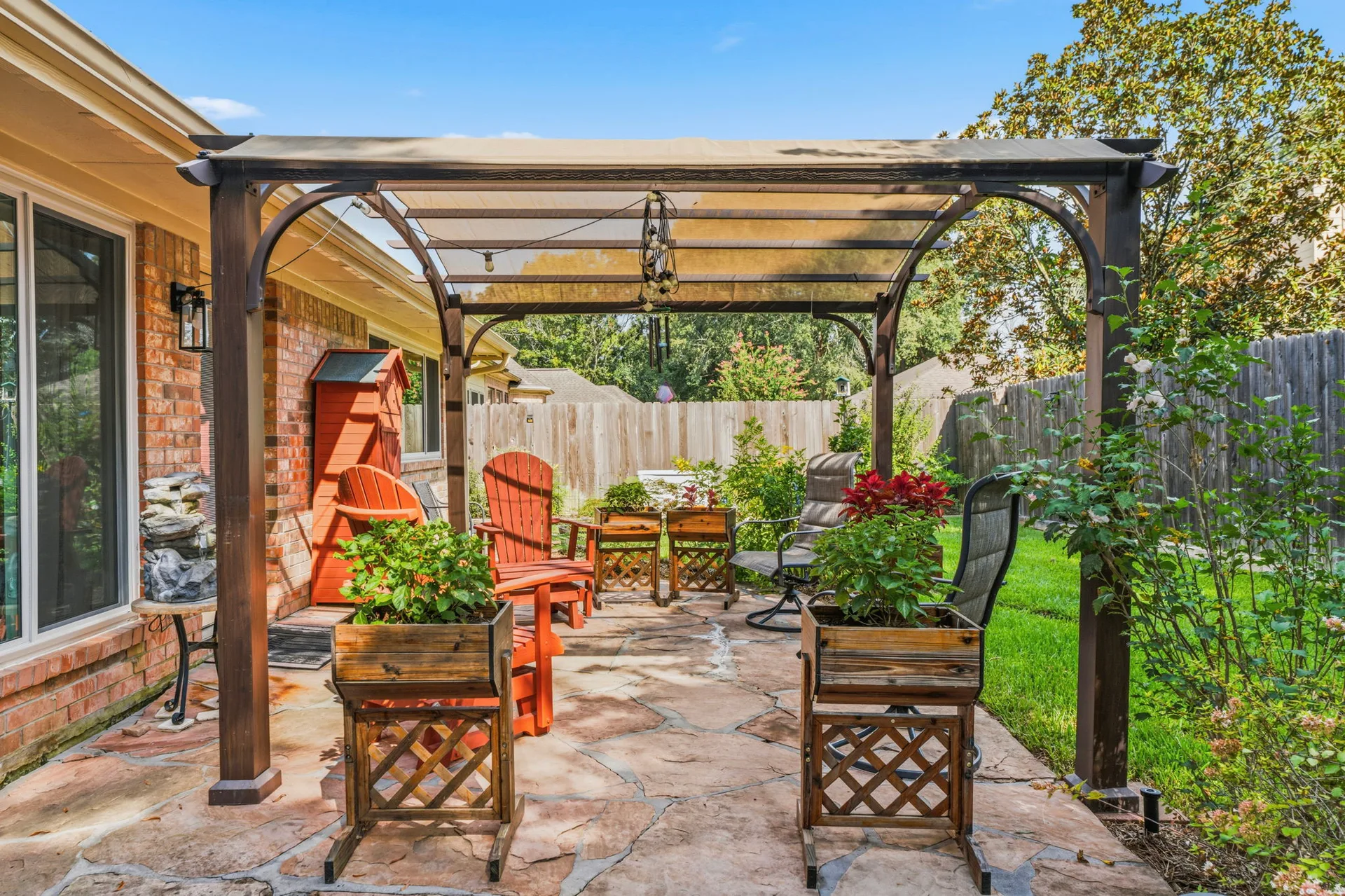 Backyard flagstone patio at 4631 Windy Gorge Drive