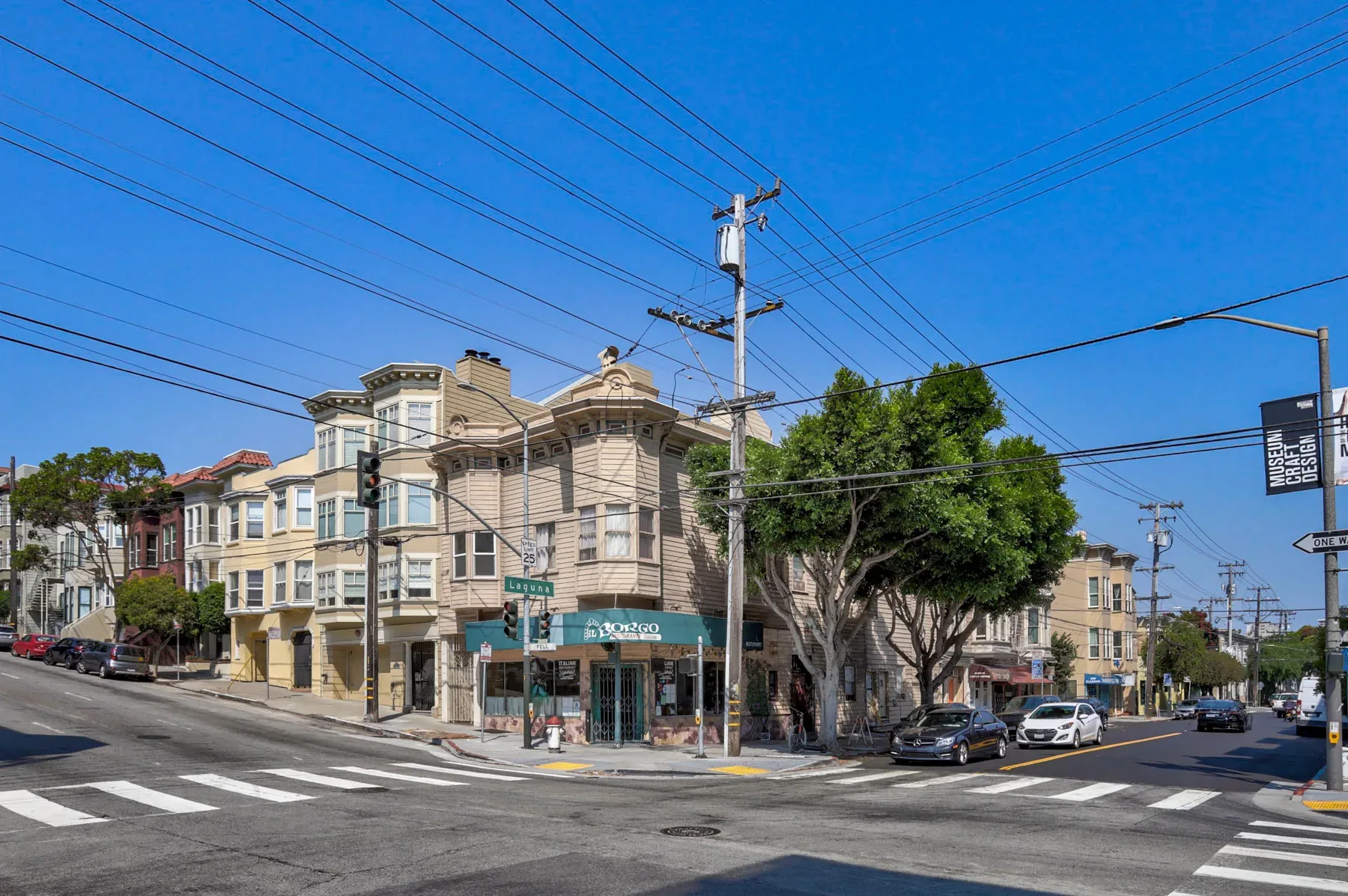 Street corner view showing Victorian commercial and residential spaces