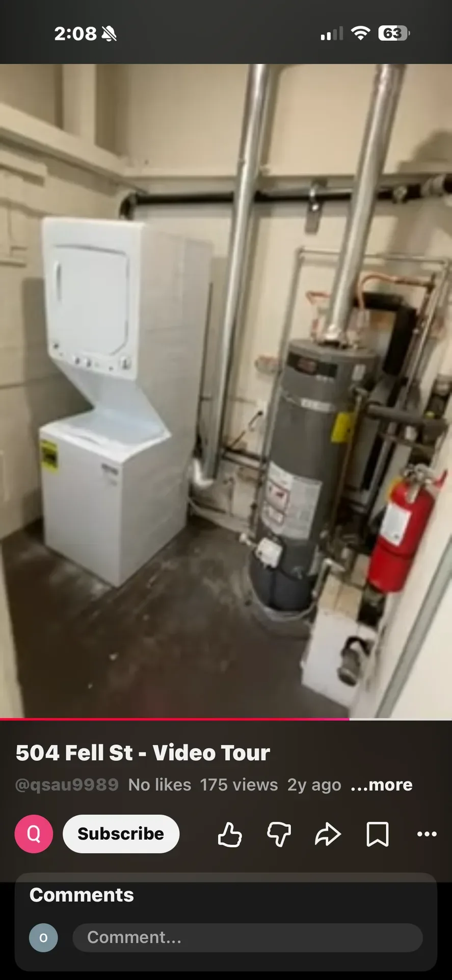 Utility and laundry closet with stackable washer/dryer and water heater