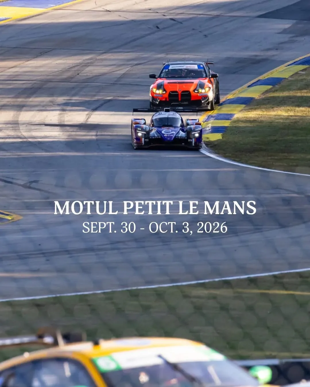 Race cars on track at Michelin Raceway Road Atlanta during the Motul Petit Le Mans endurance racing event