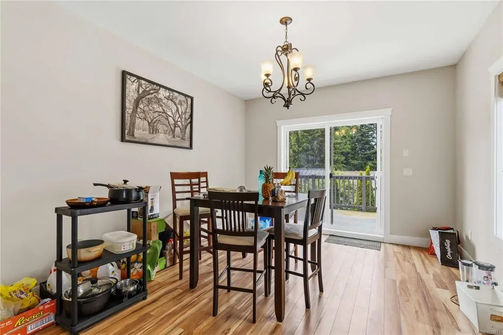 Dining area shown as currently occupied with shelving and daily use items