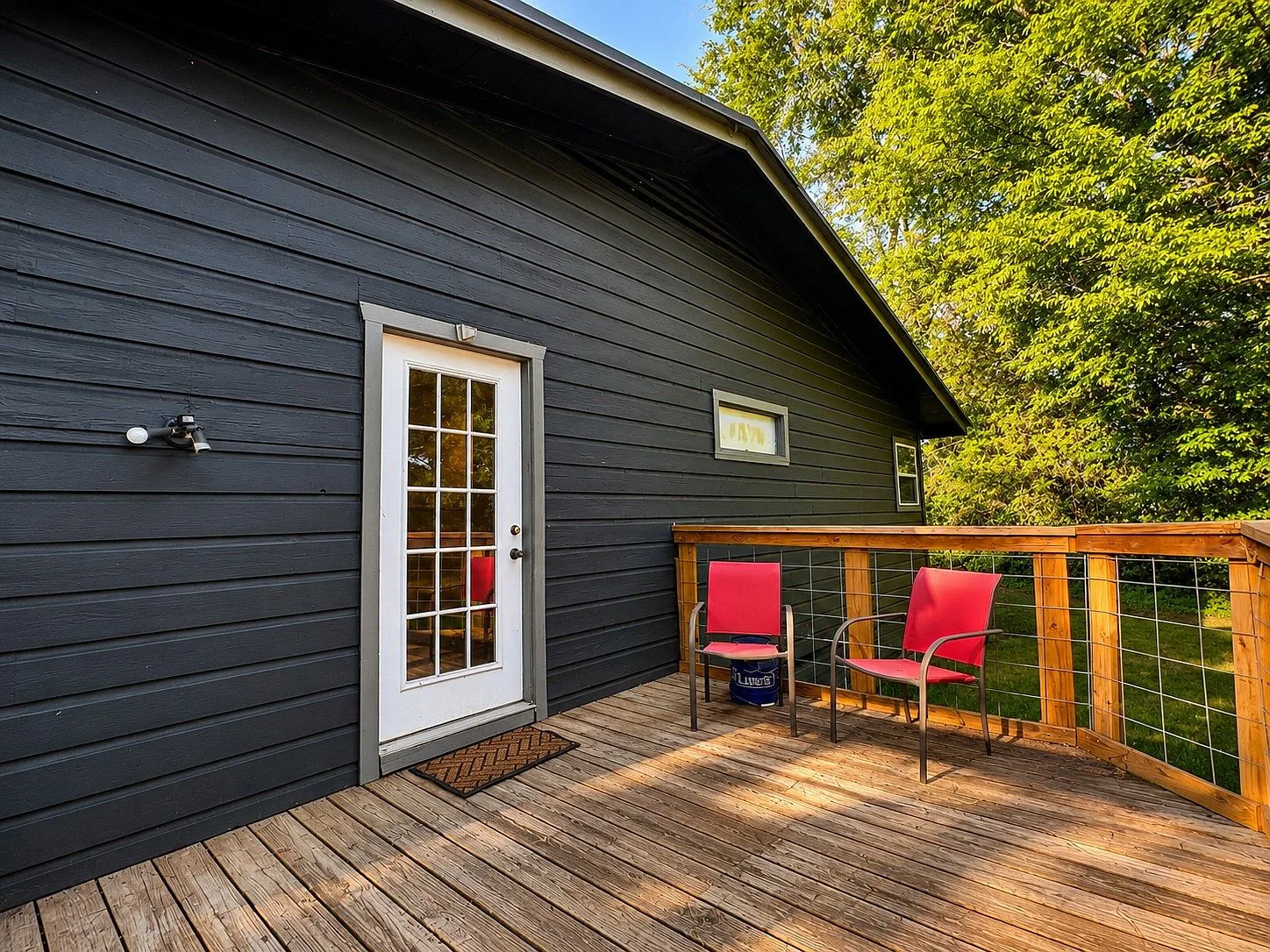 Back deck patio with cattle-panel railing