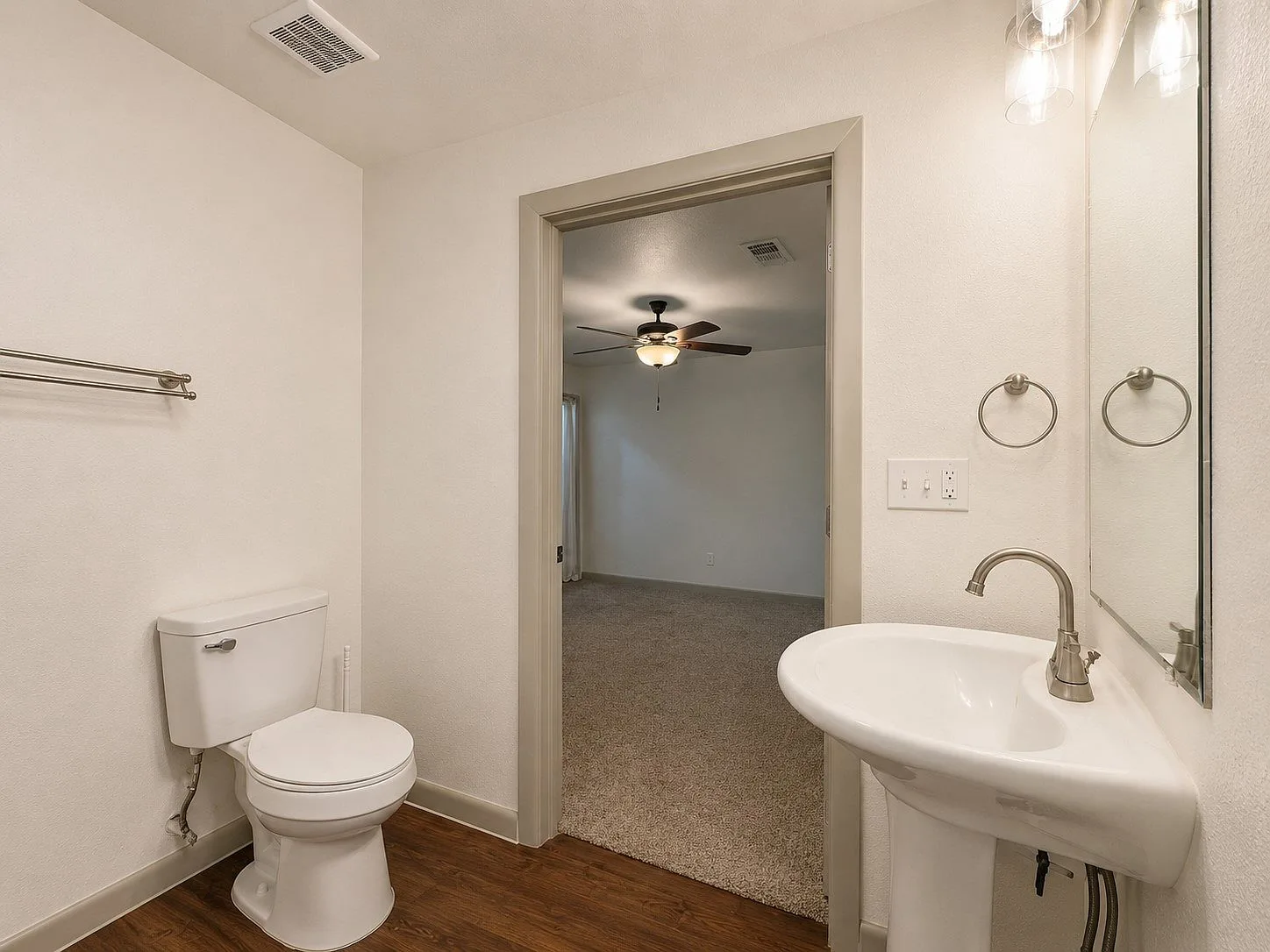 Guest bathroom with pedestal sink