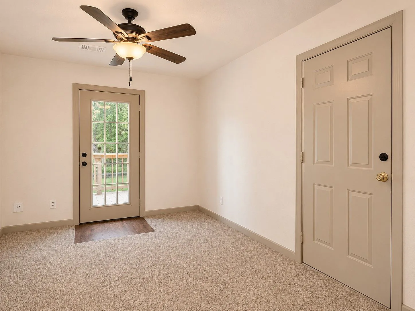 Secondary bedroom with neutral walls
