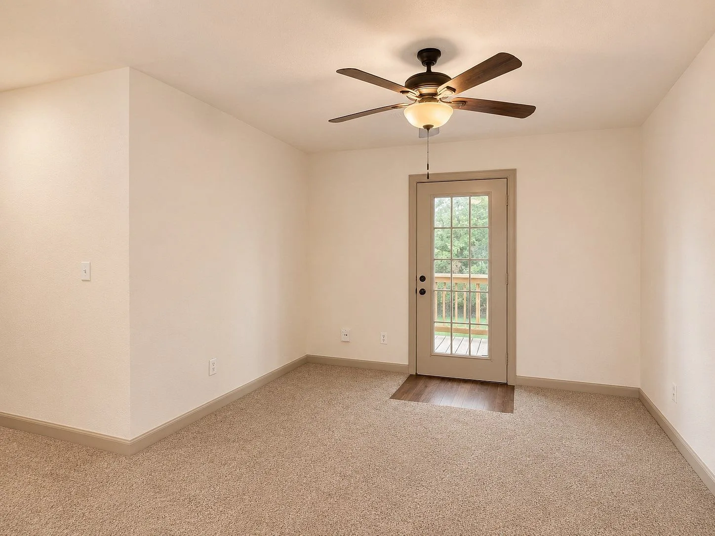 Bedroom with exterior door and natural light
