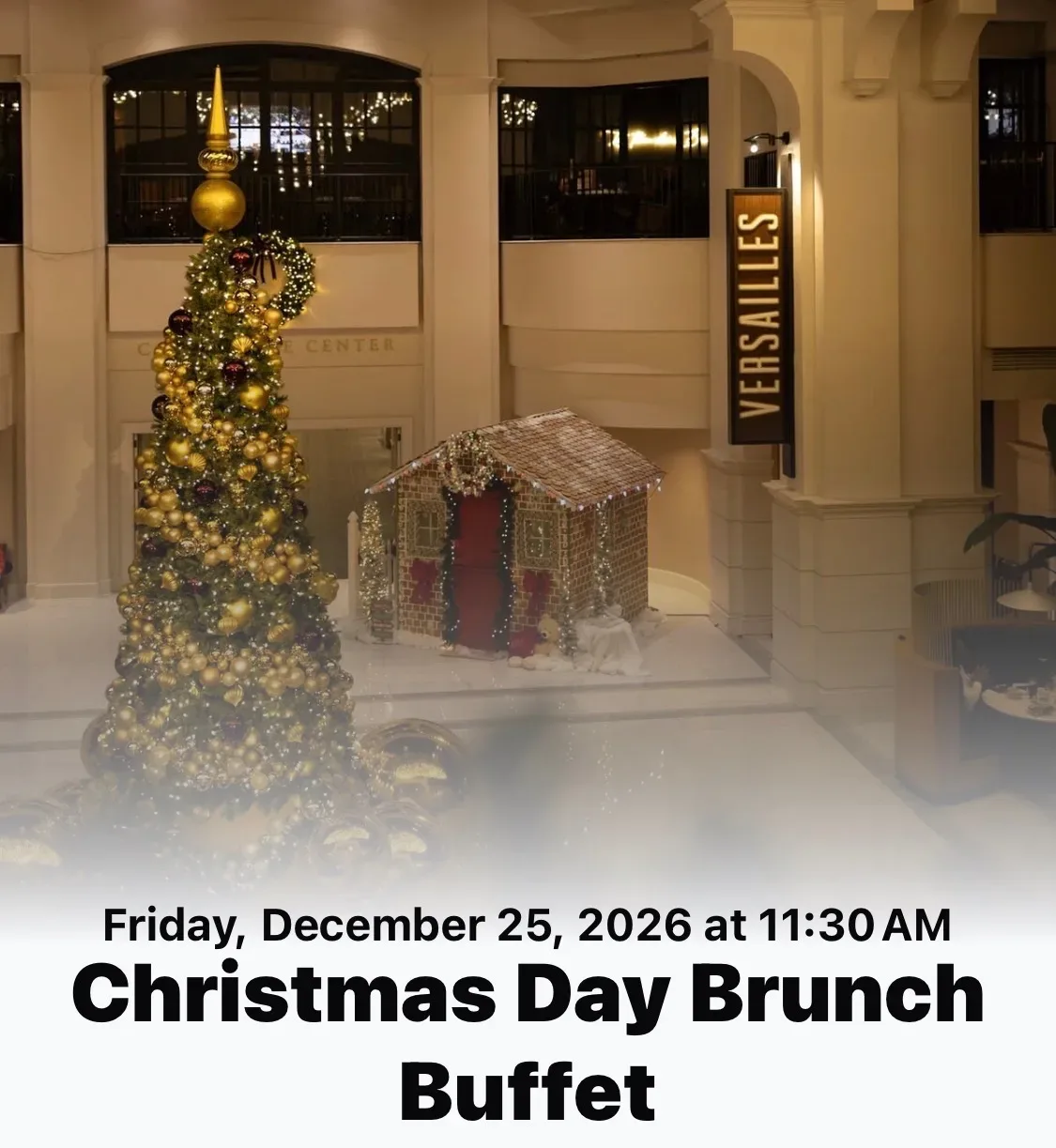 Festive lobby atrium at Chateau Elan decorated for Christmas with a grand tree, garlands, and holiday ambiance