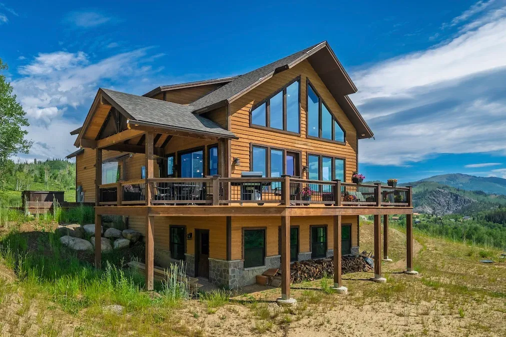 57140 Green Bird Place — rustic mountain lodge on a hillside in Clark, Colorado