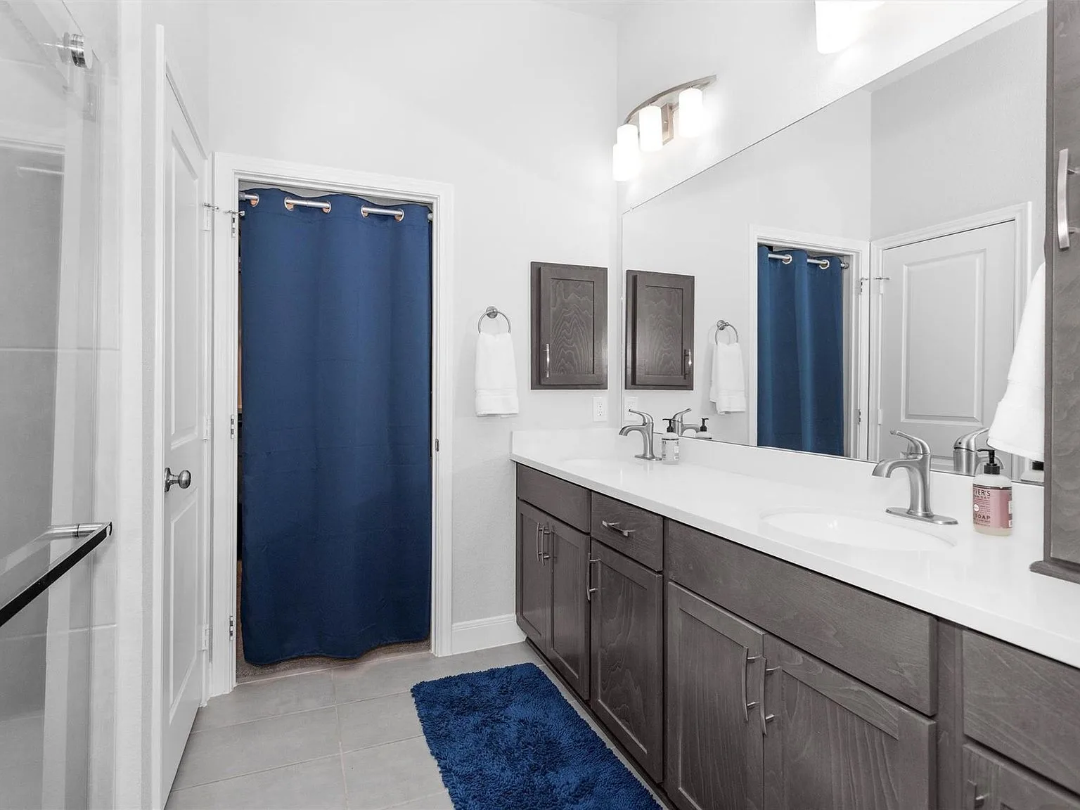 Primary bathroom with dual vanity