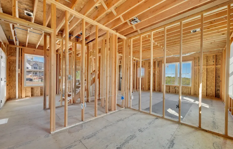 Interior framing of the new construction home showing open floor plan