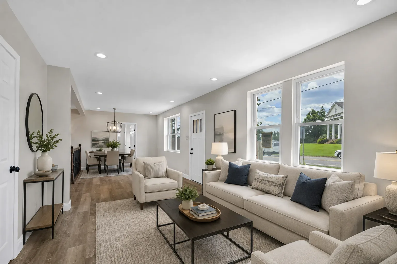 Living and dining combined space with natural daylight and modern finishes