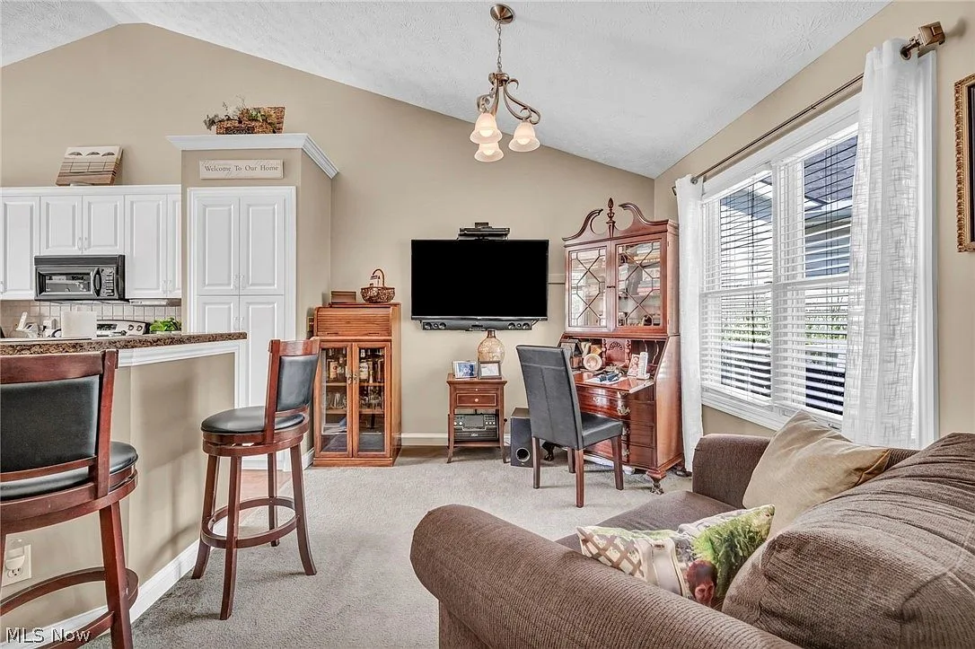Great room living area with natural daylight
