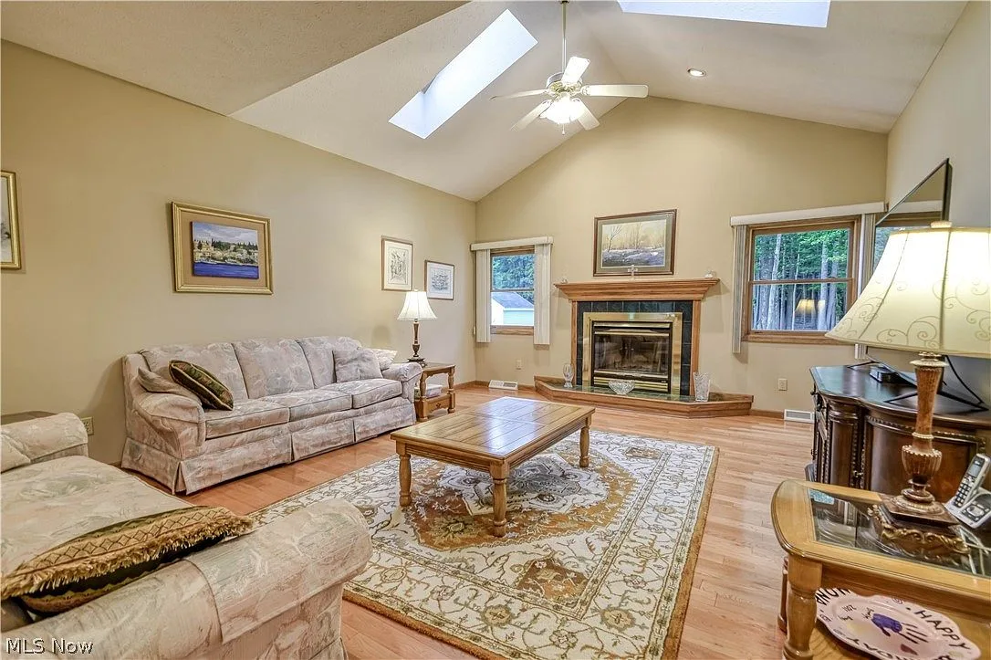 Family room with vaulted ceiling and fireplace