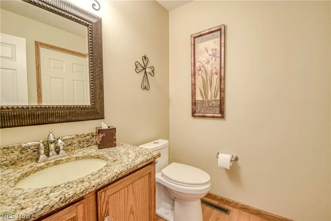 Powder room with oak vanity