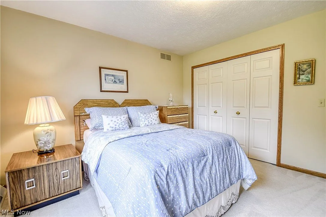 Another secondary bedroom with beige walls