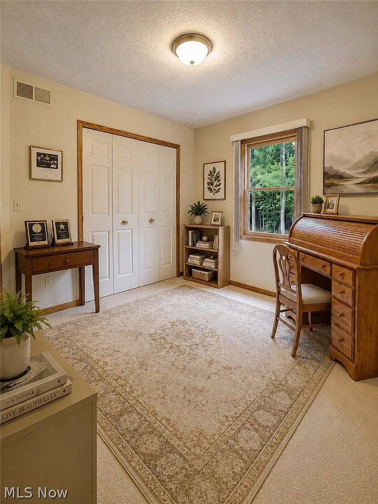 Bedroom configured as a home office