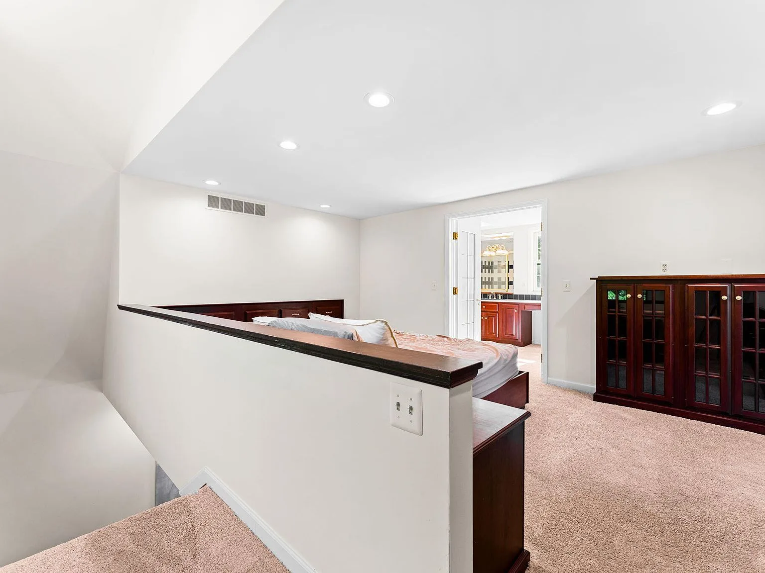 Loft bedroom space in the carriage house with ensuite bathroom