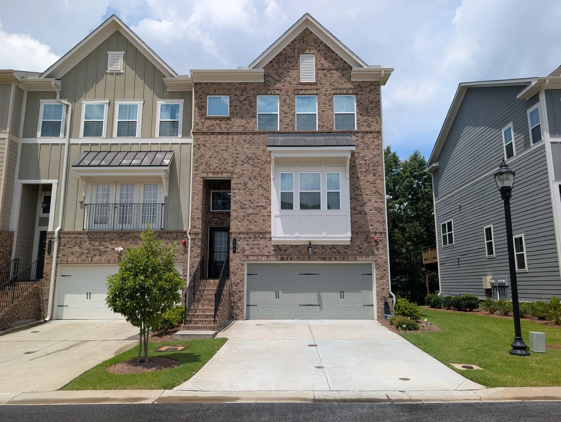 A brick townhome investment property in Metro Atlanta that sold with Tommy Williams in August 2026