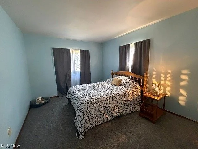 Bedroom with light blue walls