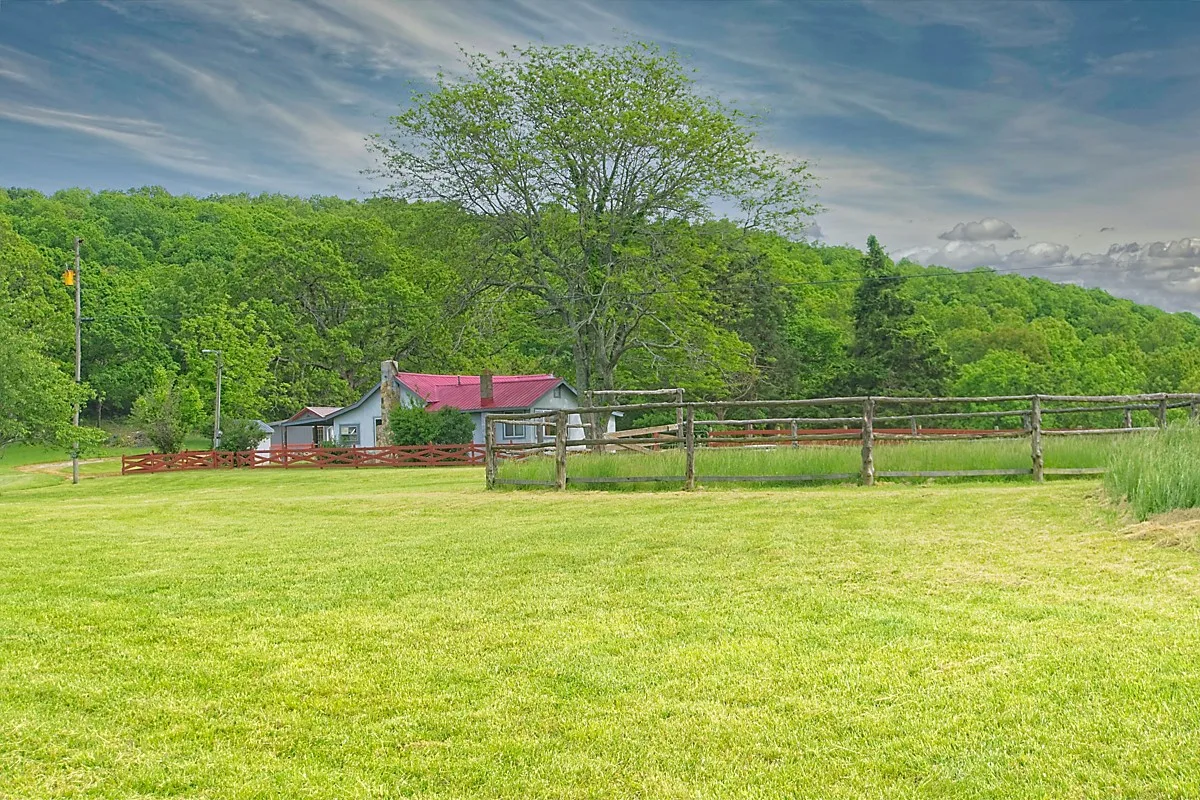 SOLD farmhouse on 32 acres in Mansfield, MO