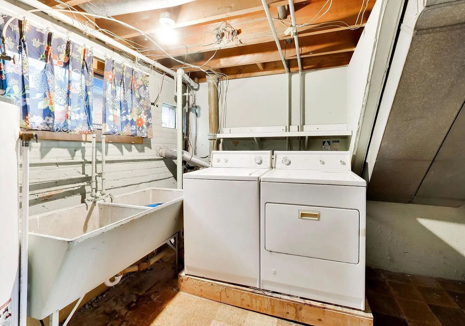 Basement laundry and utility area