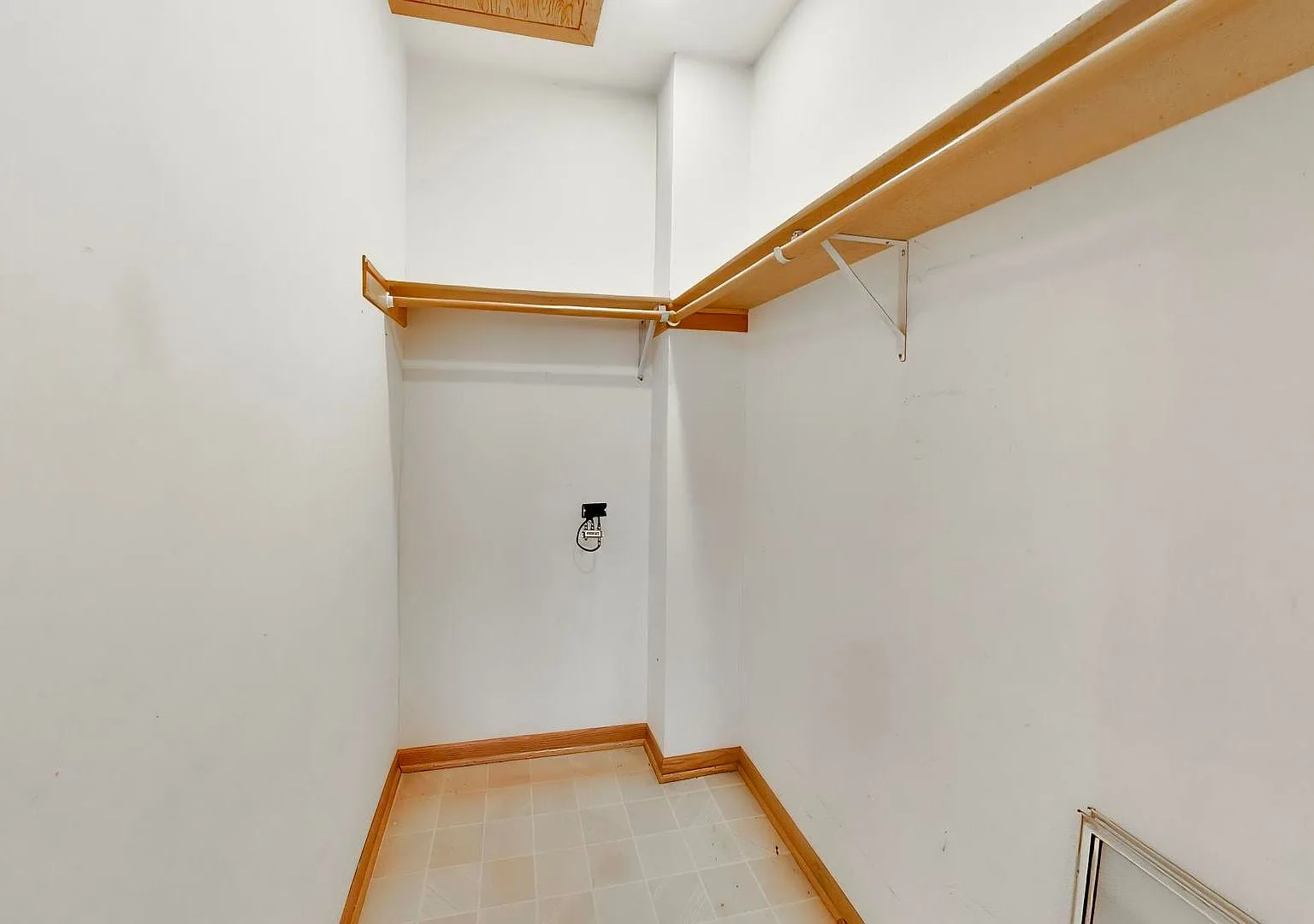 Walk-in closet with shelving