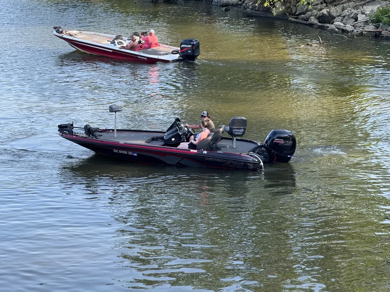 Two fishing boats out on the waters of Lake Hudson for a day of recreation