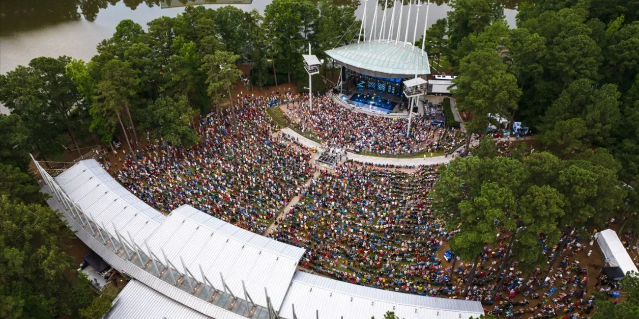 Drone aerial view of Koka Booth Amphitheatre outdoor concert venue in Cary North Carolina