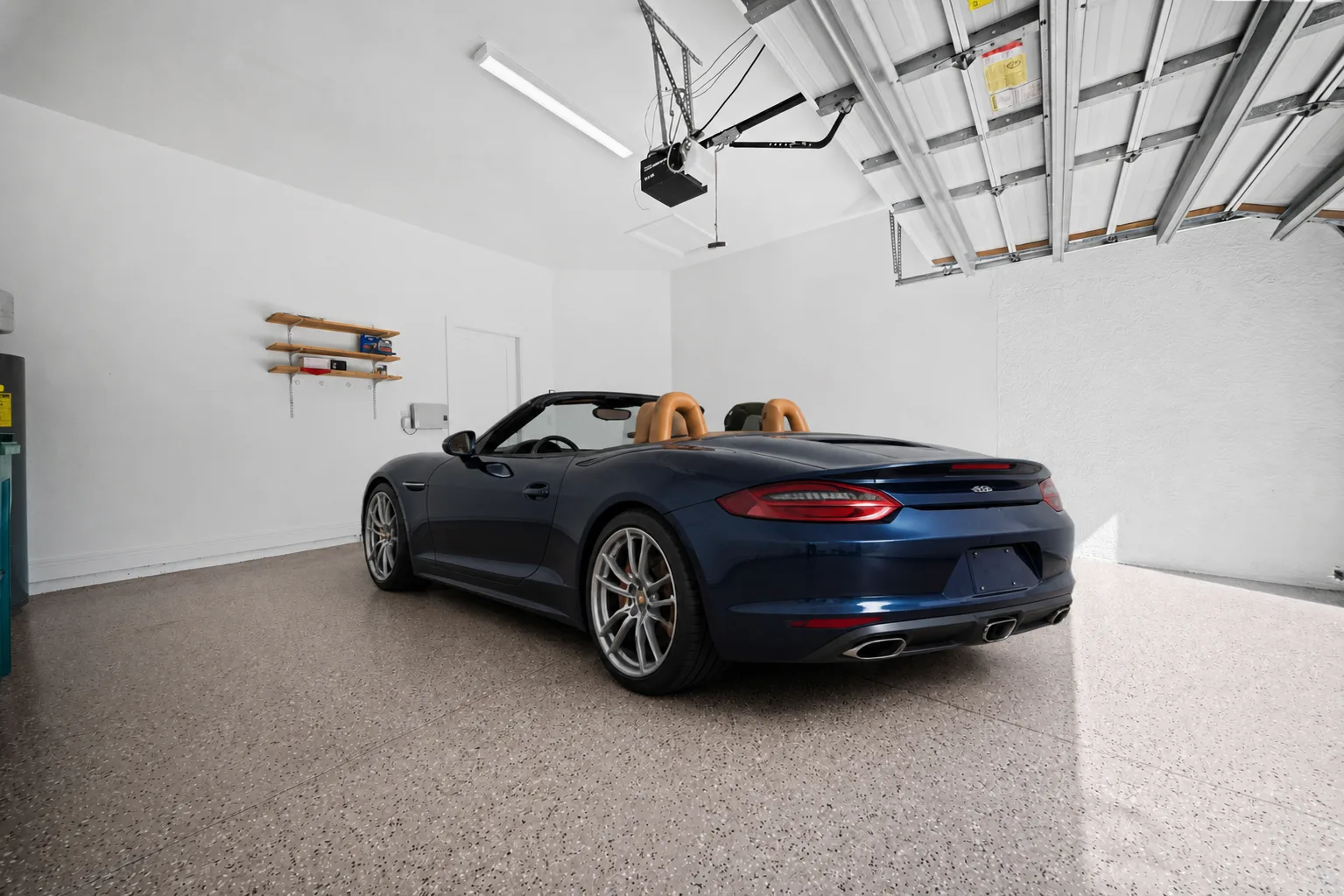 Garage : Virtually Staged. Shown virtually staged to illustrate the scale and capacity of the attached two-car garage.