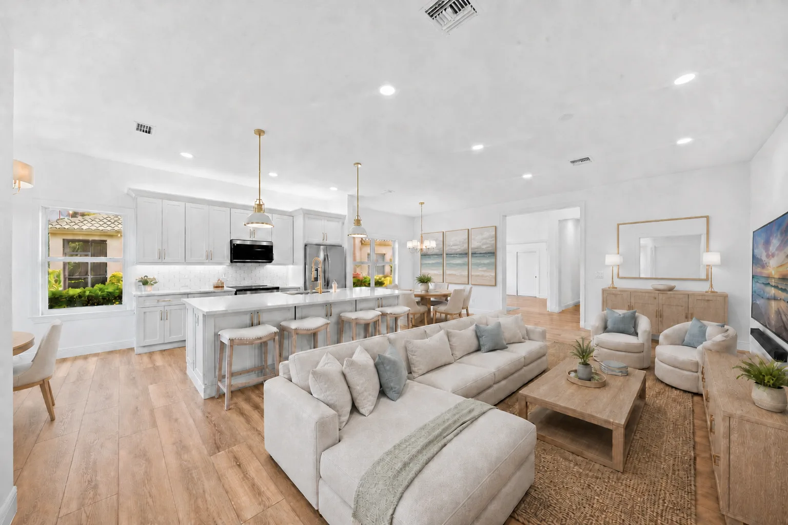 Great Room : Virtually Staged. Virtually staged to illustrate the scale of the open living area and a possible conversational seating arrangement oriented toward the media wall and lake-facing side of the home.