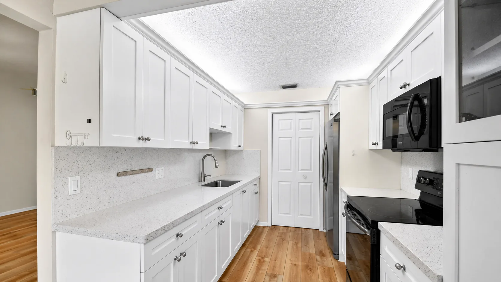 Updated kitchen with quartz countertops at 6105 Fairfield Circle
