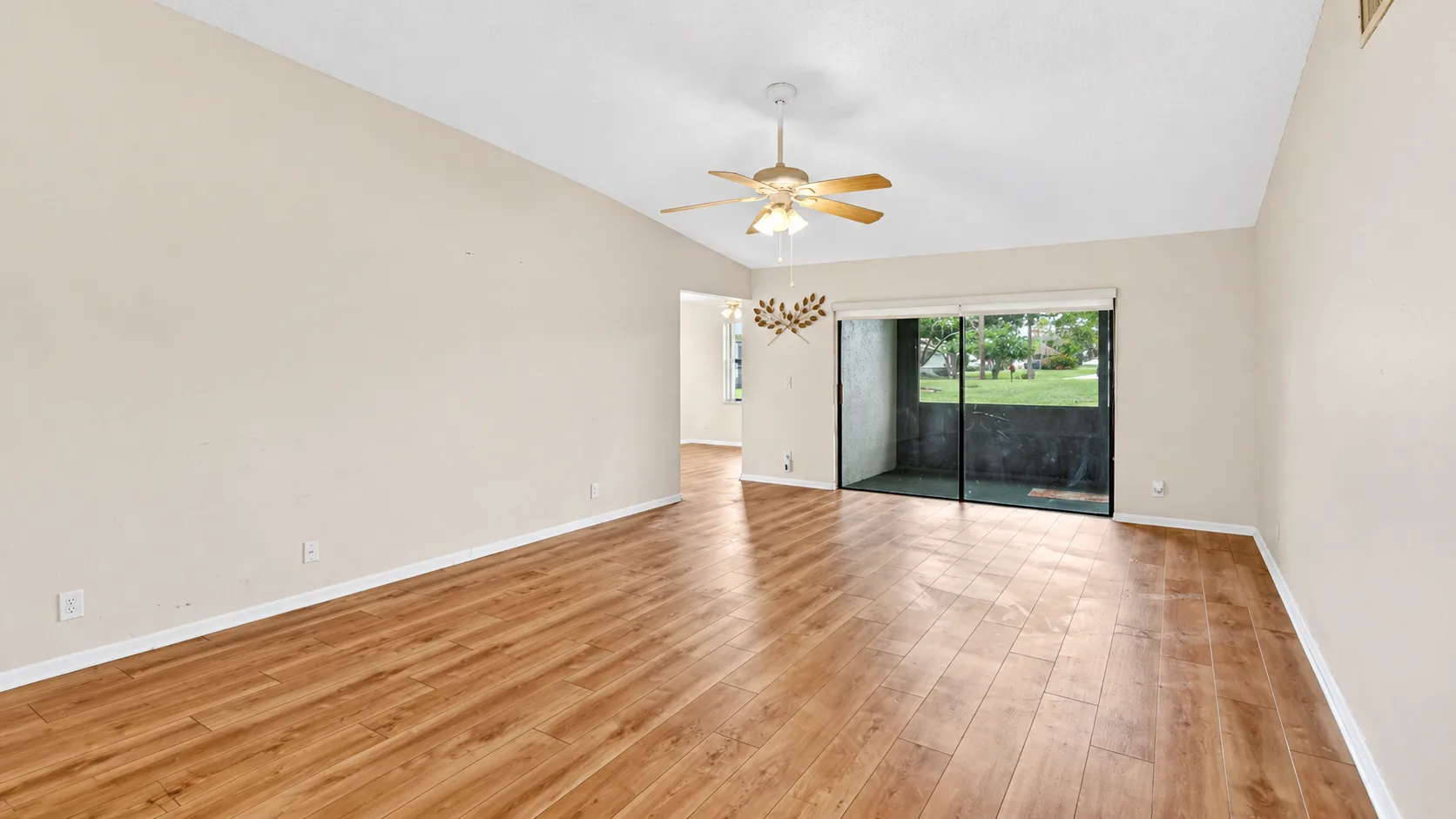 Spacious living area at 6105 Fairfield Circle with vaulted ceiling