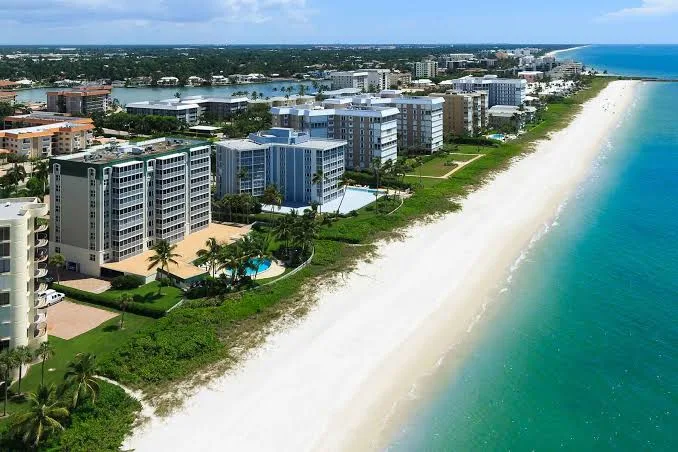 Aerial view of beachfront condominium residences in Pelican Bay