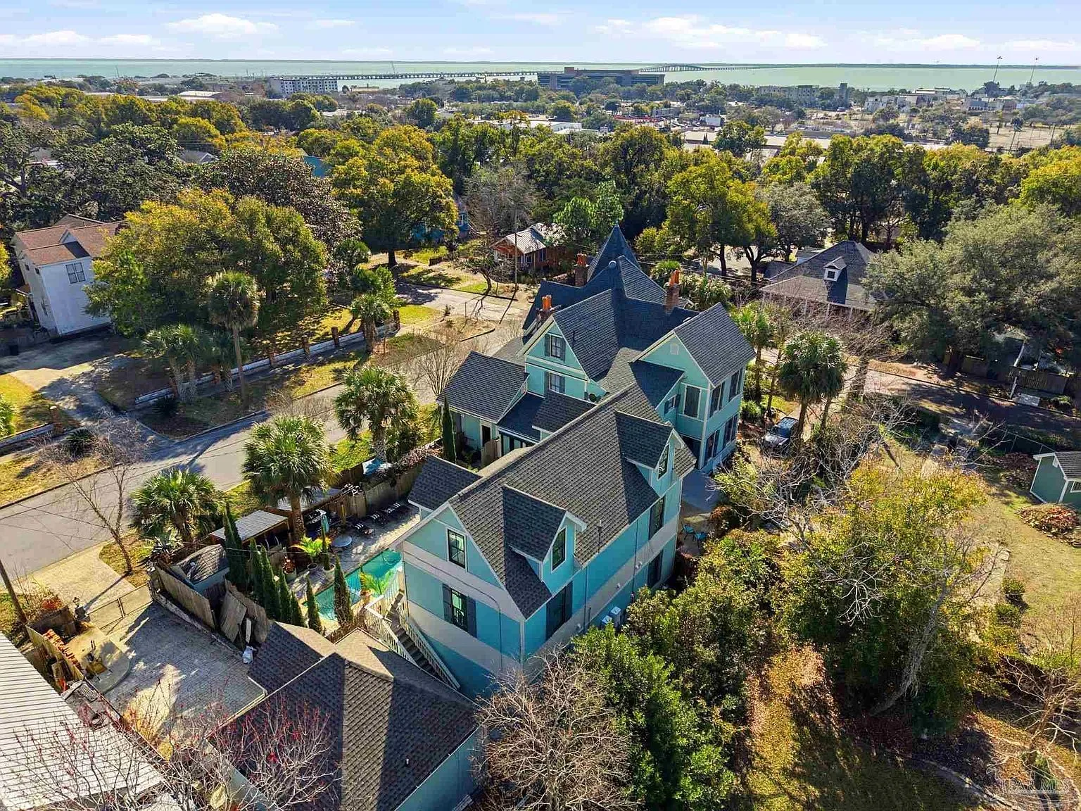 Aerial view of the estate compound and surrounding Old East Hill with Pensacola Bay in the background.