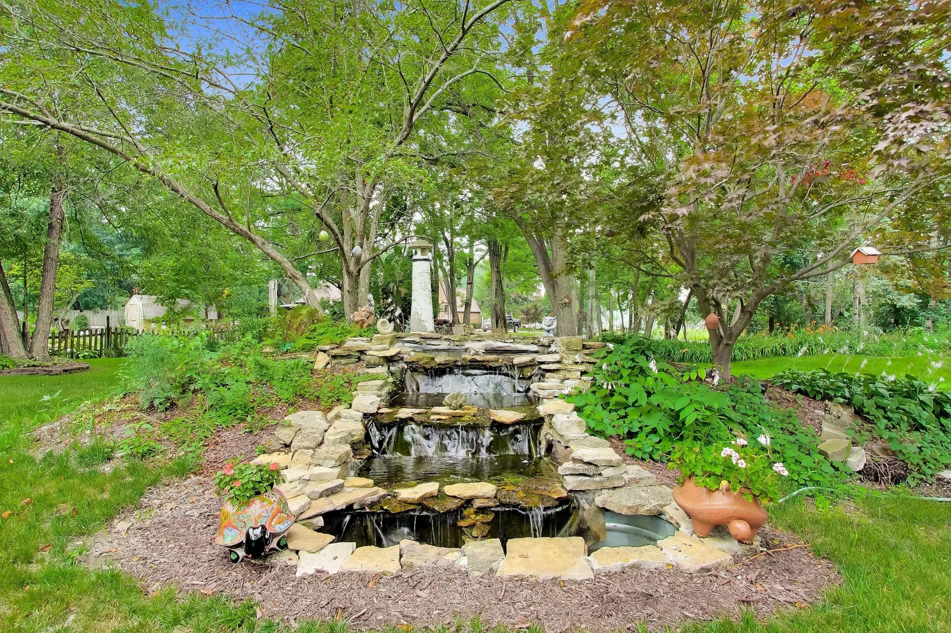 Stone pond in the landscaped backyard
