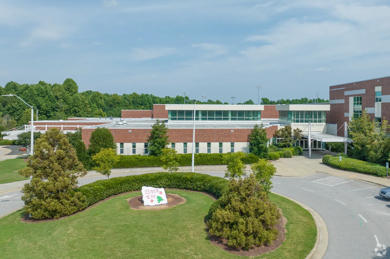 Aerial photo of a school building and campus grounds
