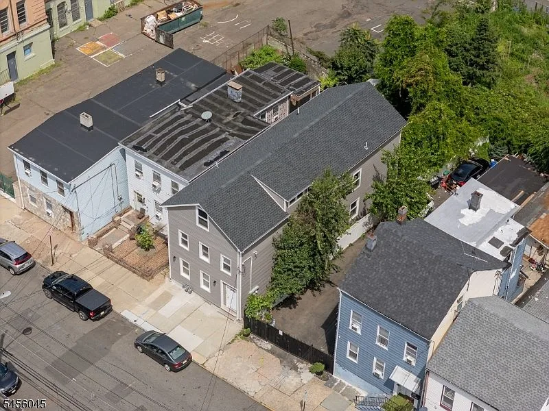 Aerial view of a multi-family residential street near 113 Marshall St in Paterson, NJ.