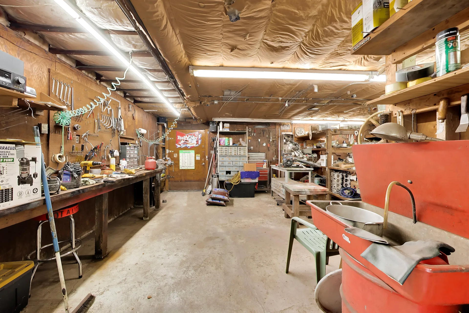 Workshop with shelving, workbench, and room for tools