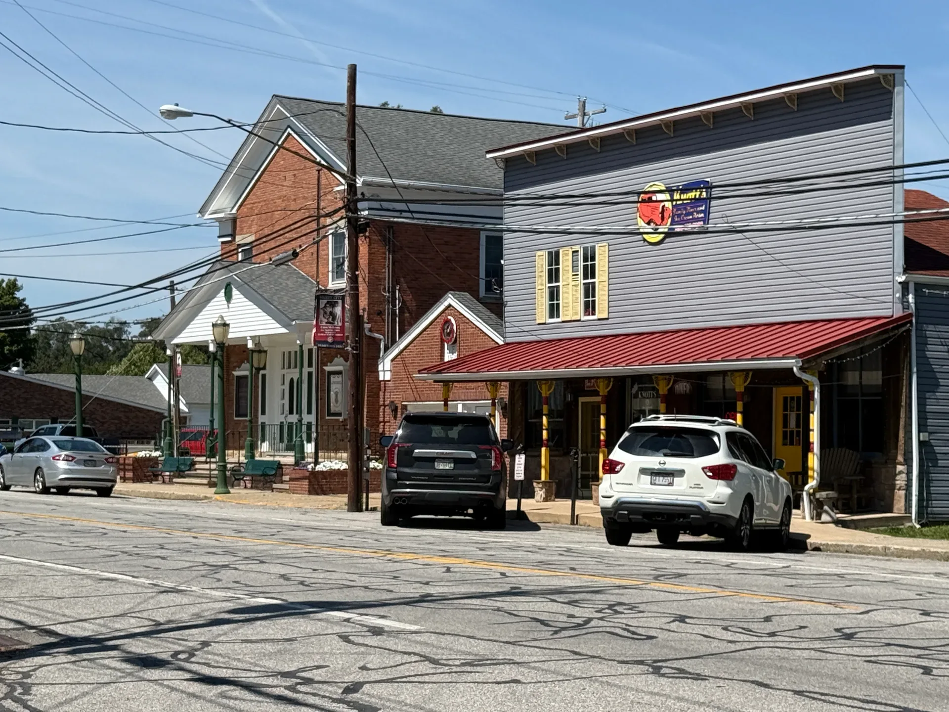 Brick and siding storefronts along a Valley City street