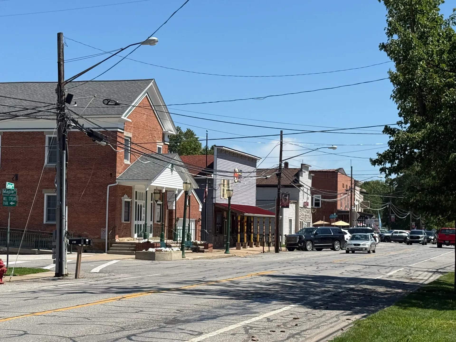 Valley City business district storefronts under a bright blue sky