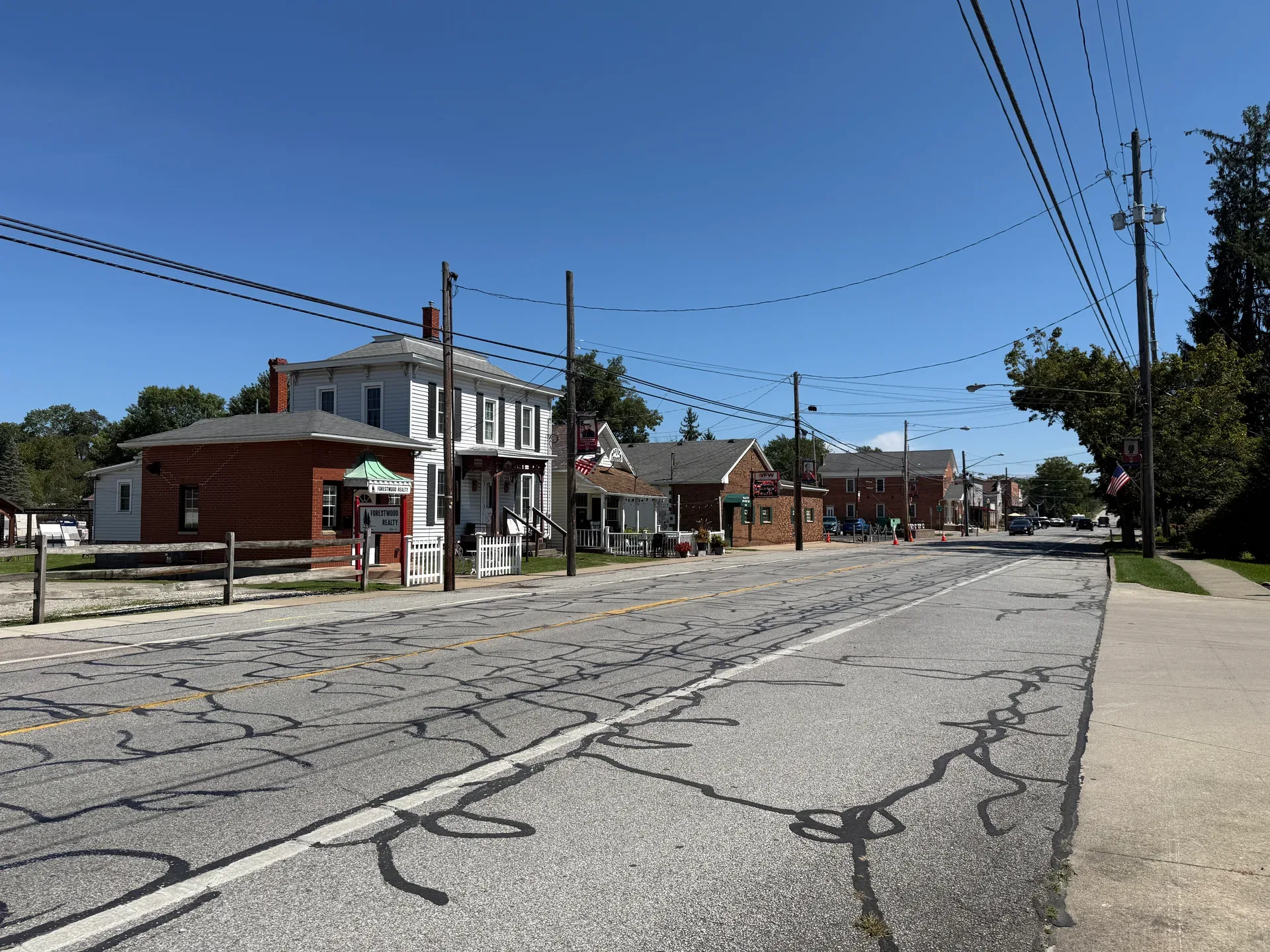 Small-town street view of brick and clapboard buildings in Valley City