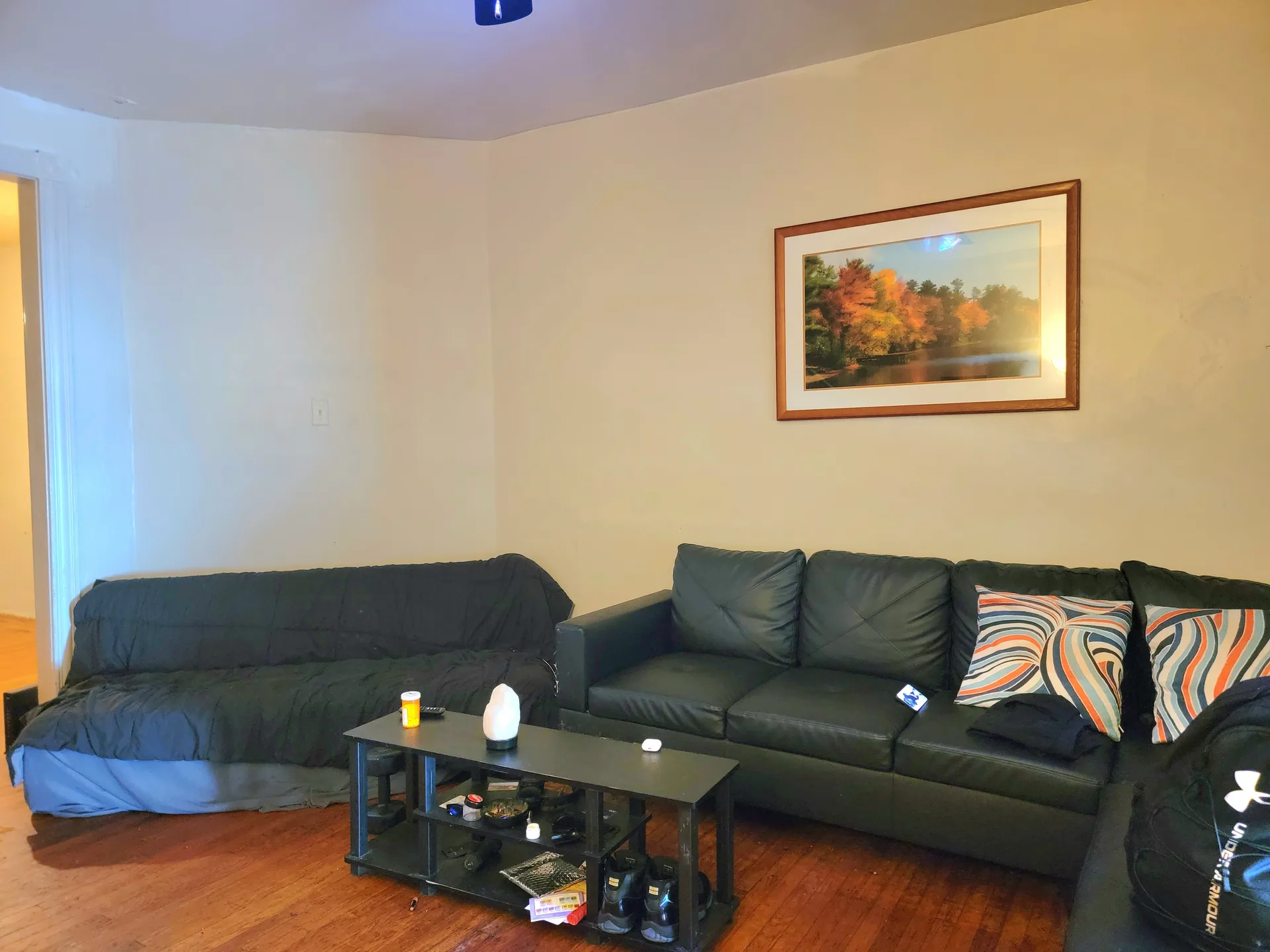 A lived-in living room in a long-time Philadelphia family home, the kind of home many Fox Chase homeowners with a reverse mortgage work to protect