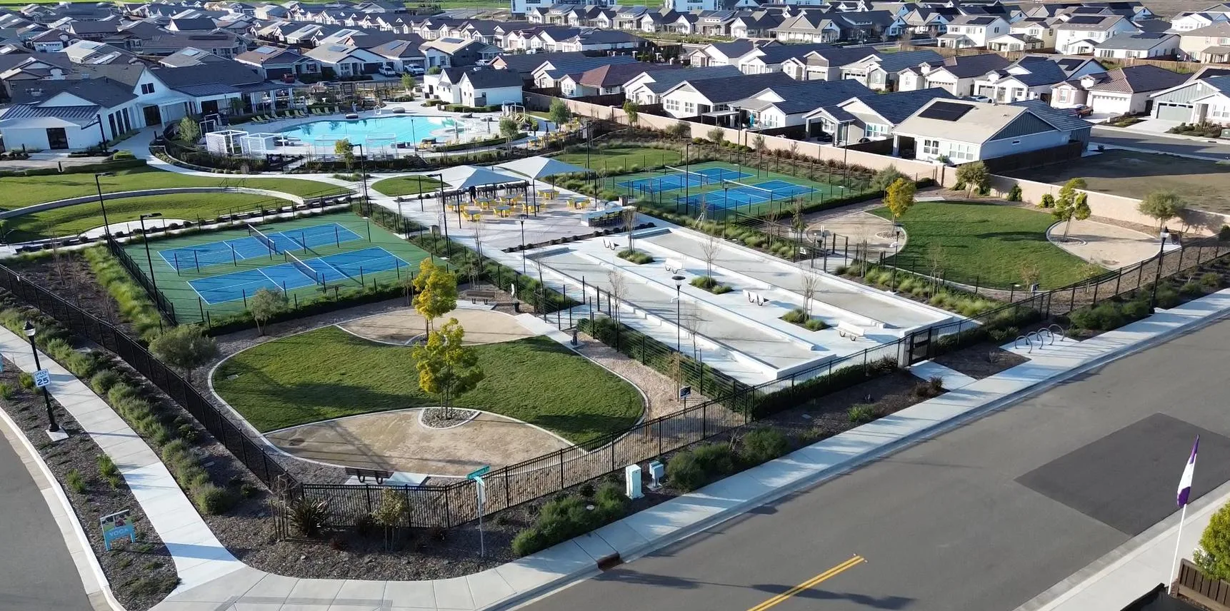 Aerial view of recreation courts and pool at a Northern California 55+ community