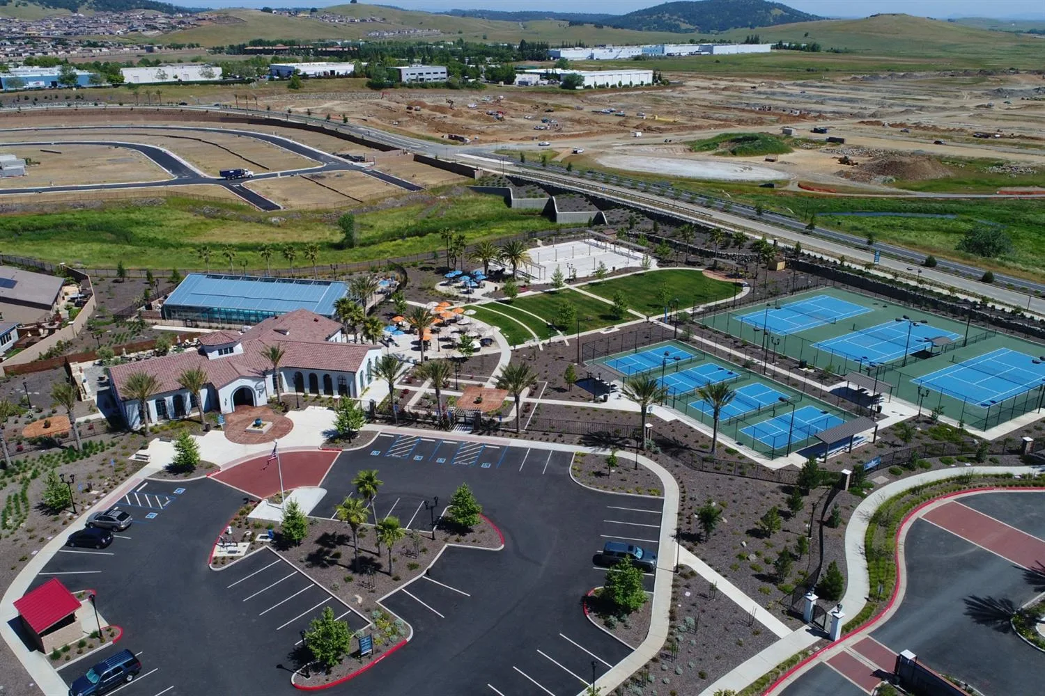 A drone view of the amenity center at Heritage El Dorado Hills, the 55+ active-adult community in El Dorado Hills, California