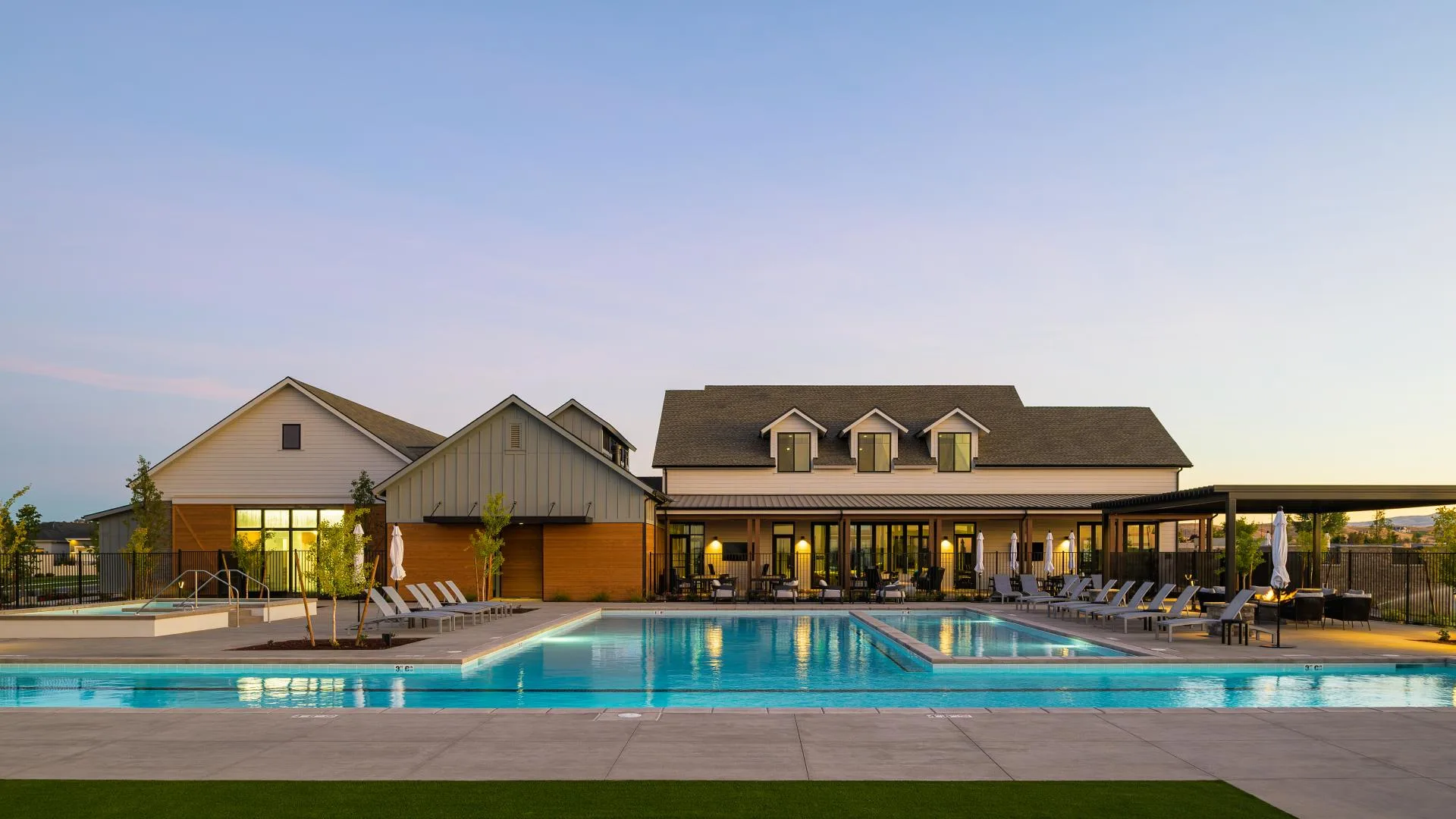 The resort-style pool and clubhouse at Regency at Folsom Ranch in Folsom, California, at twilight
